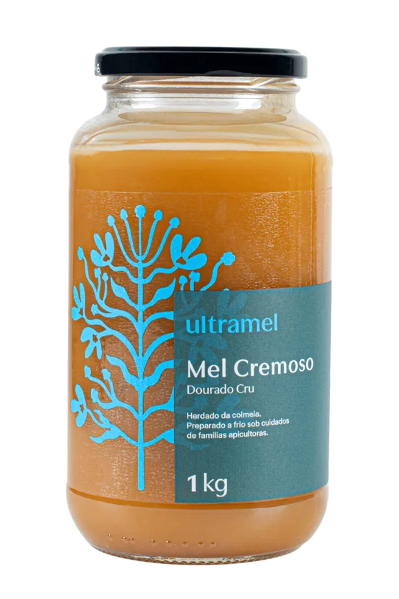 Pote de vidro de 1 kg do Mel Cru Cremoso Dourado da Ultramel, rótulo verde azulado