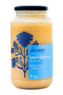 Pote de vidro de 1 kg do Mel Cru Cremoso Branco da Ultramel, rótulo azul claro